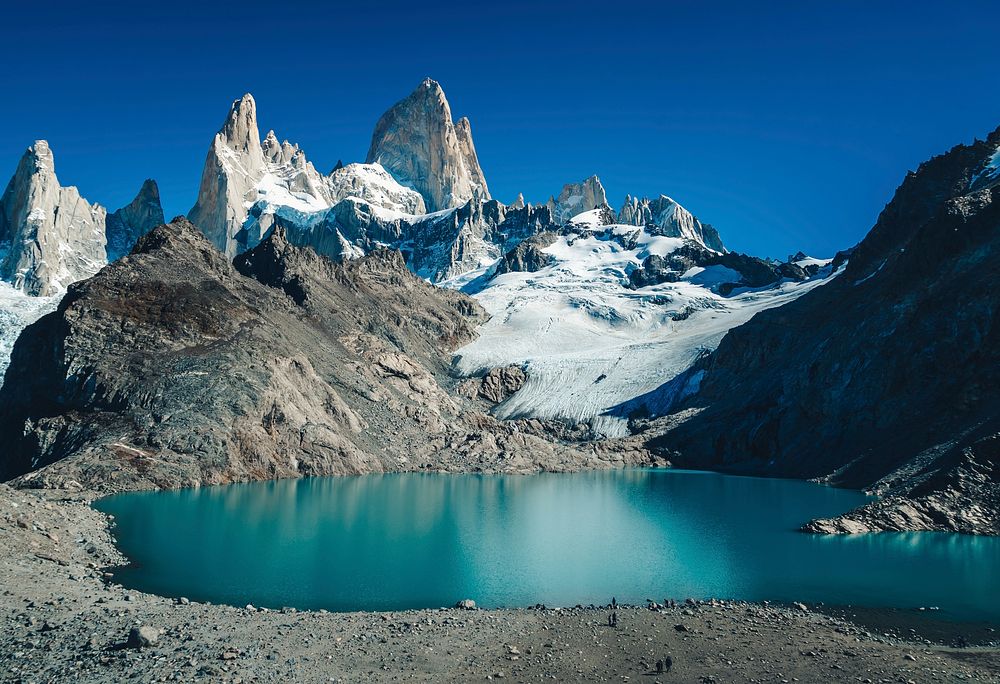 An azure lake by the Fitz Roy mountain in Argentina. Original public domain image from Wikimedia Commons