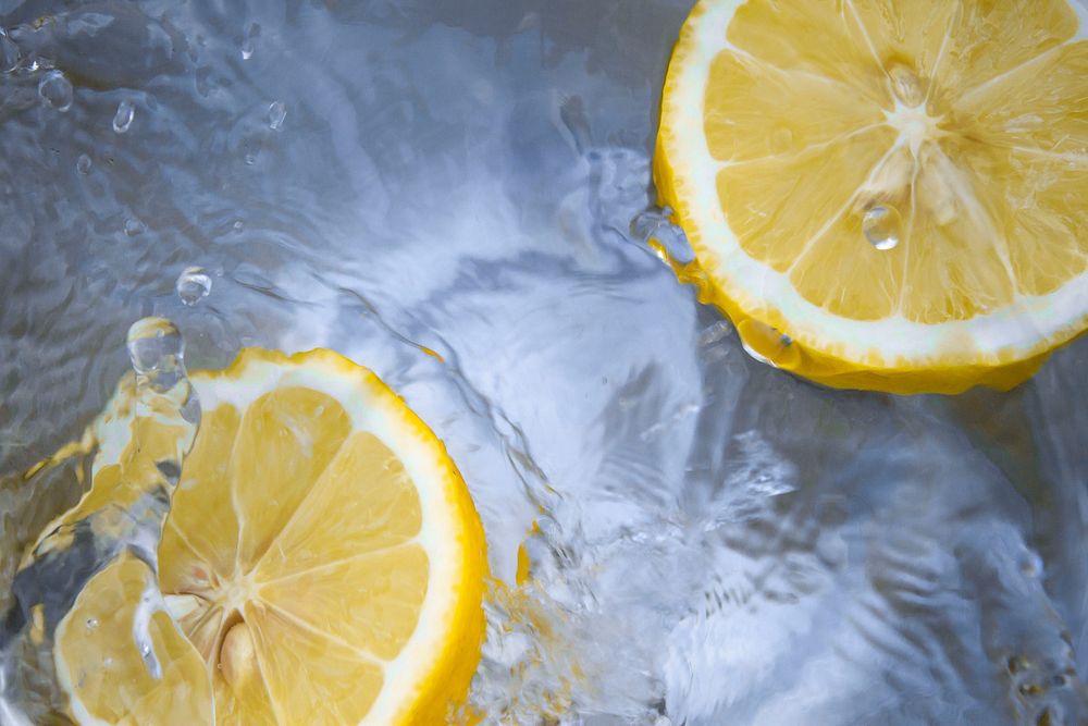 Lemons floating in water. Original public domain image from Wikimedia Commons