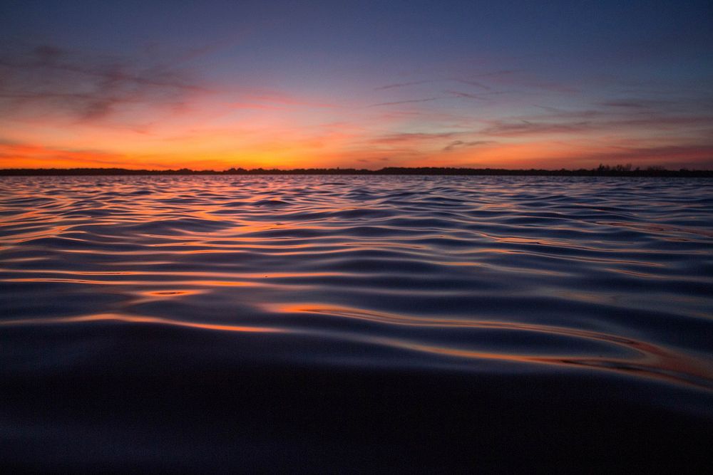 Rippling water beautiful sunset scenery. Original public domain image from Wikimedia Commons