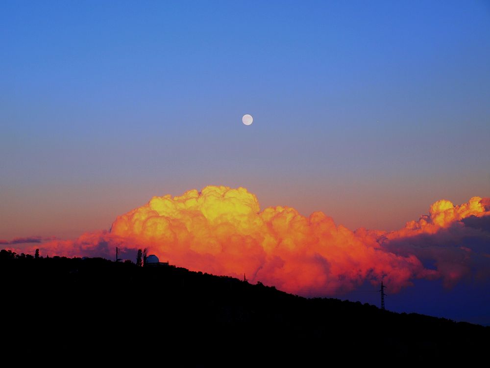 Beautiful scenery at dawn with hill, cloud and moon. Original public domain image from Wikimedia Commons