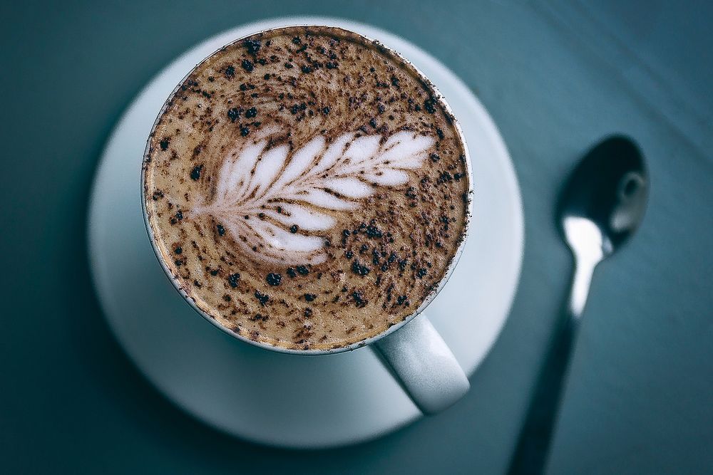 Aesthetic latte art background. Original public domain image from Wikimedia Commons