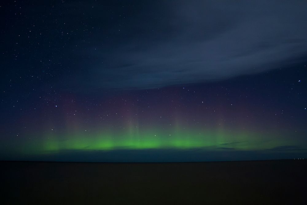 The Northern Lights across the sky as seen in Ontario.. Original public domain image from Wikimedia Commons