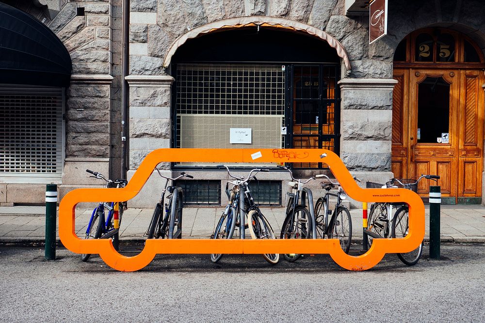 Creative street art for bike station. Original public domain image from Wikimedia Commons