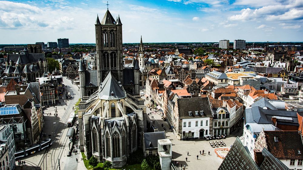 A shot from above the cathedral and architecture in the town of Ghent.. Original public domain image from Wikimedia Commons