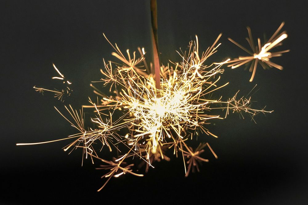 Sparkler background. Original public domain image from Wikimedia Commons