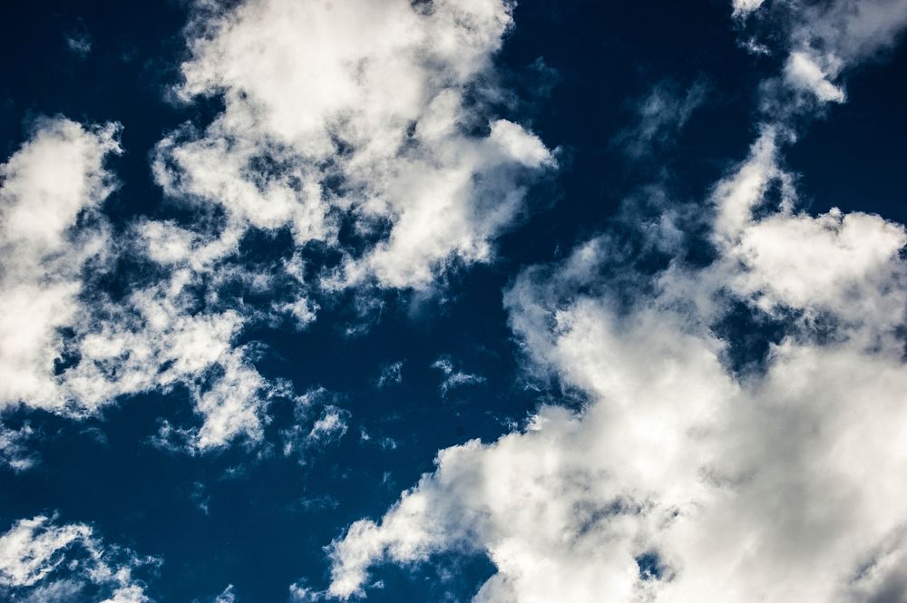 Clouds in blue sky. Original public domain image from Wikimedia Commons