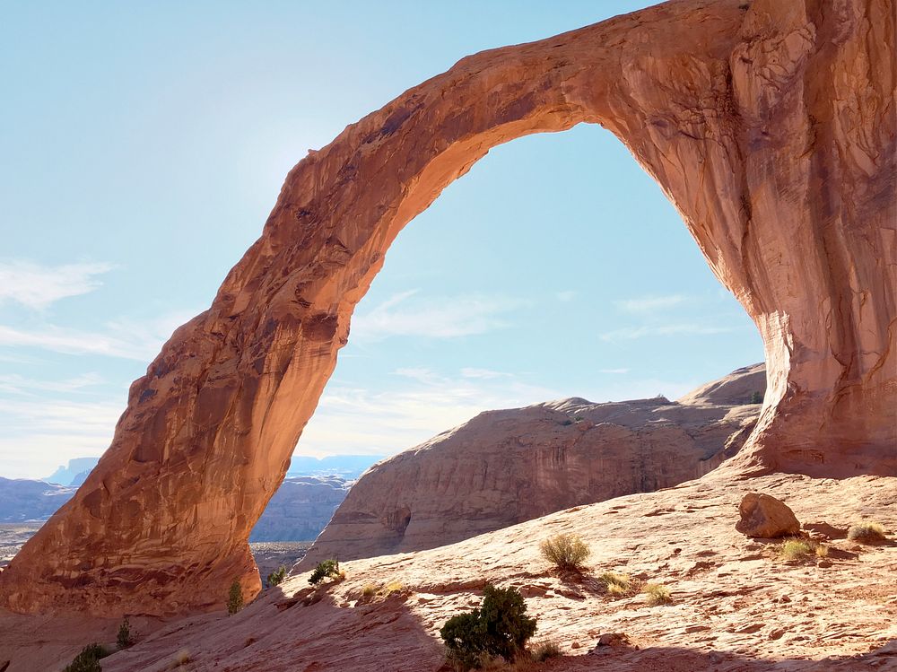 Naturally formed arch in the desert. Original public domain image from Wikimedia Commons