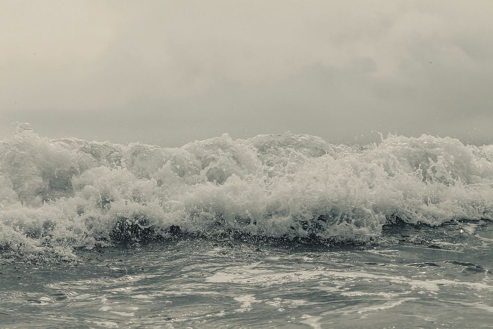 Ocean waves, foam, tide, grayscale. Original public domain image from Wikimedia Commons
