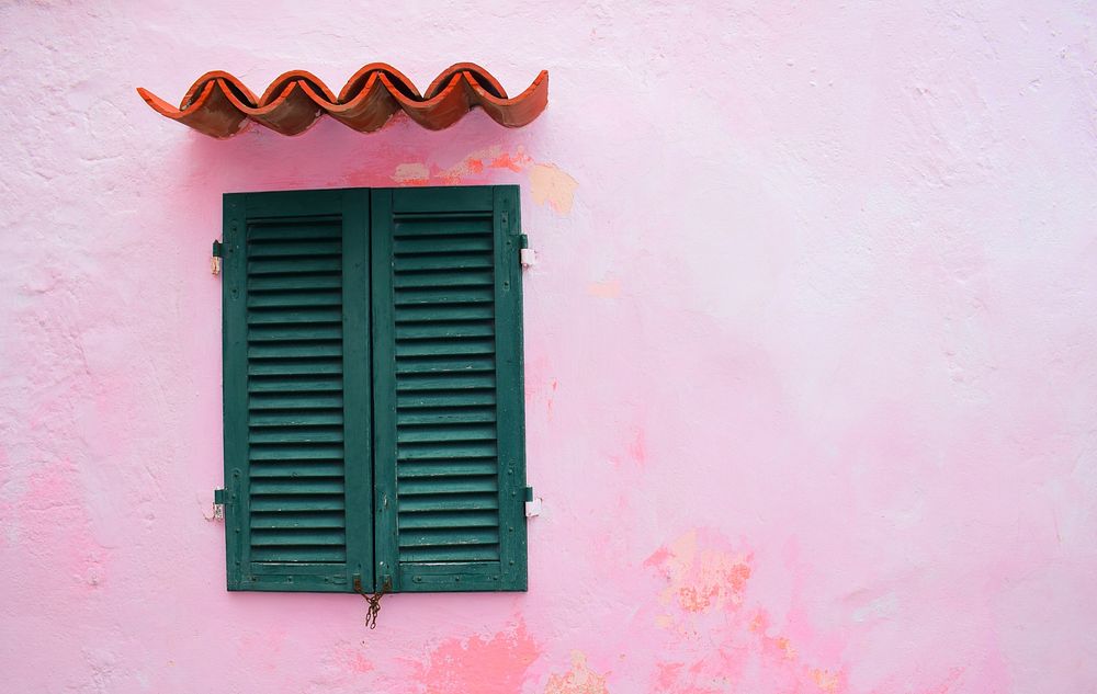 Pink terracotta walls and green window. Original public domain image from Wikimedia Commons