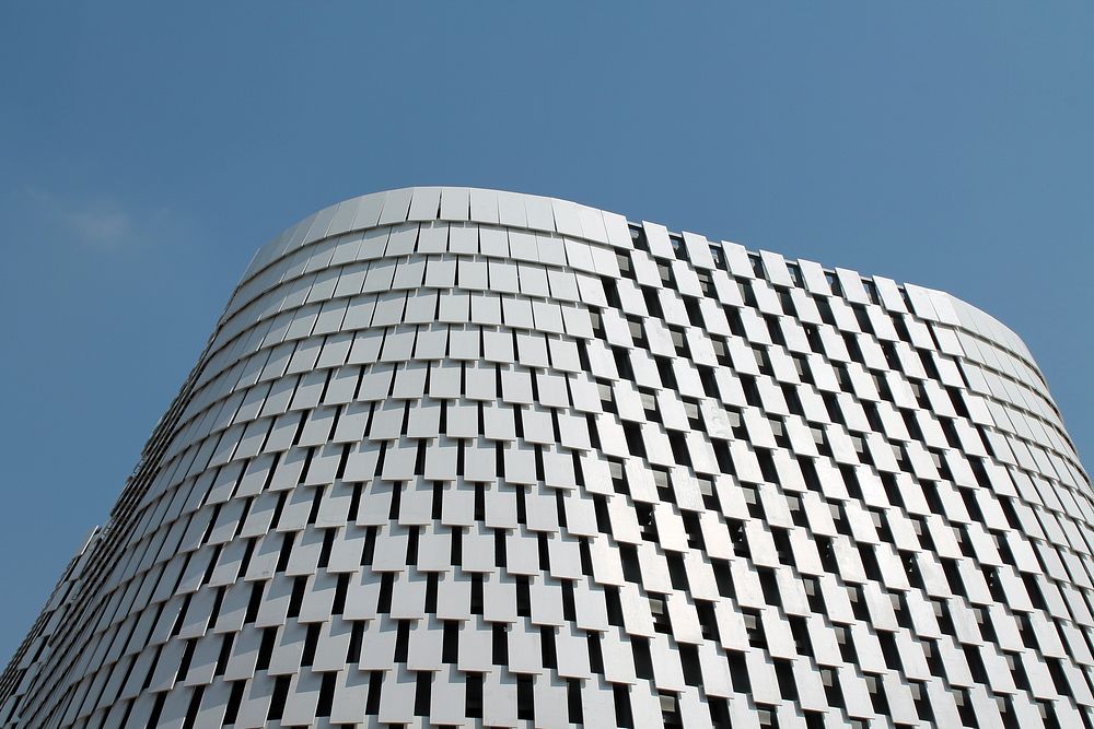 A building facade covered with white plates in Milan. Original public domain image from Wikimedia Commons