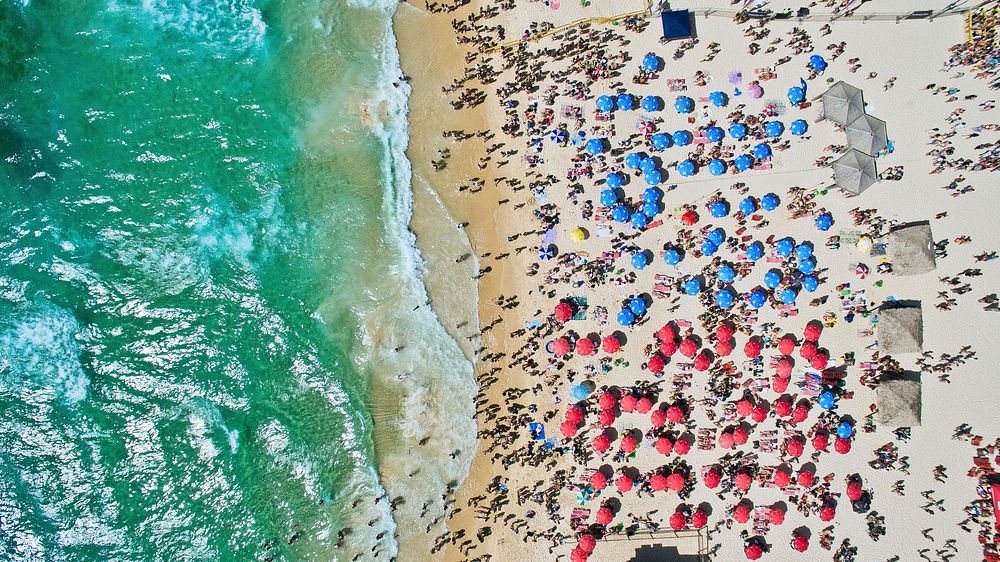 Crowded beach with vacationers, drone view. Original public domain image from Wikimedia Commons