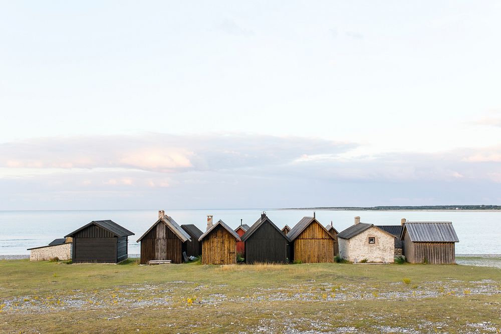Little tiny houses or sheds by the lake in Fårö. Original public domain image from Wikimedia Commons