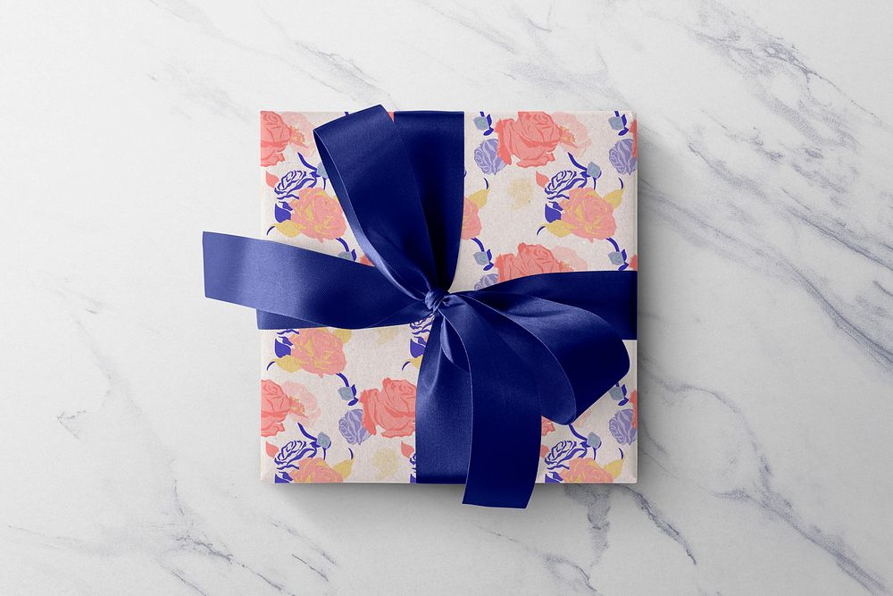 Floral gift box colorful roses paper wrap with blue ribbon