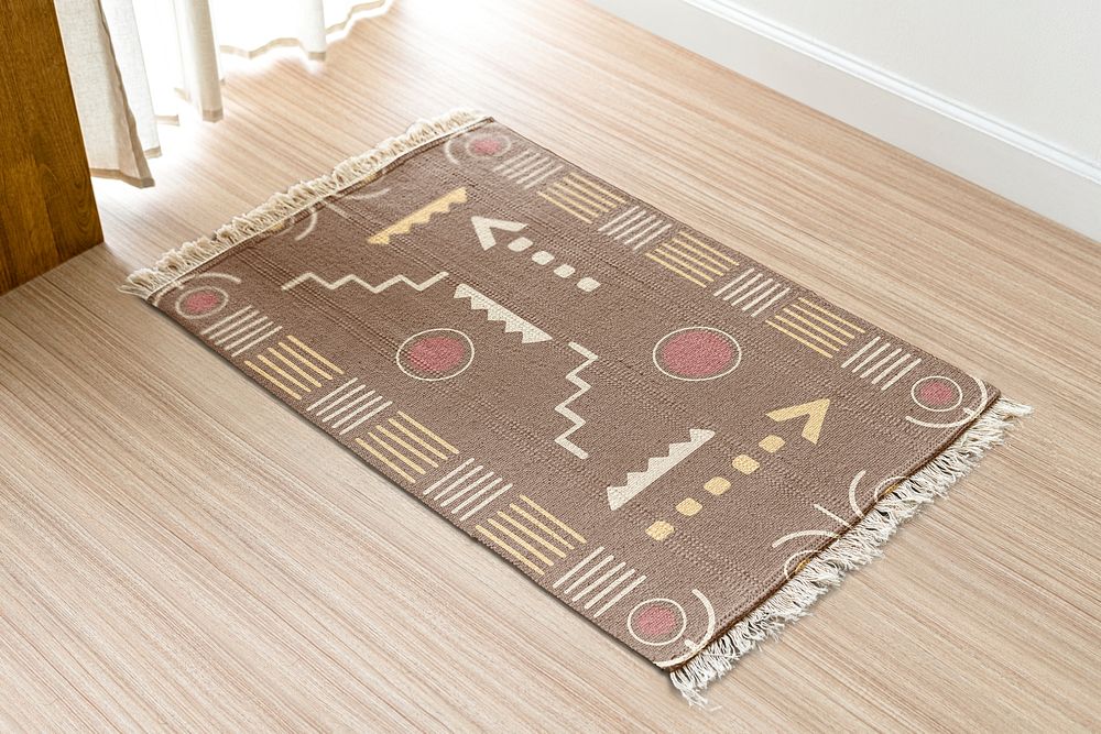 Brown woven tribal pattern carpet, on wooden floor