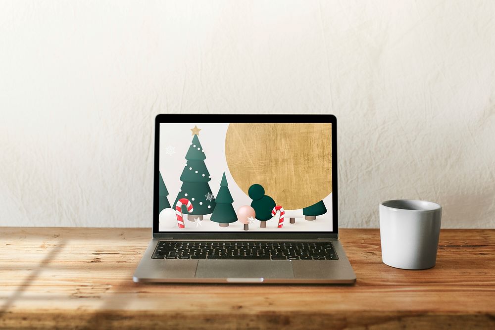 Merry Christmas 3D design on laptop screen
