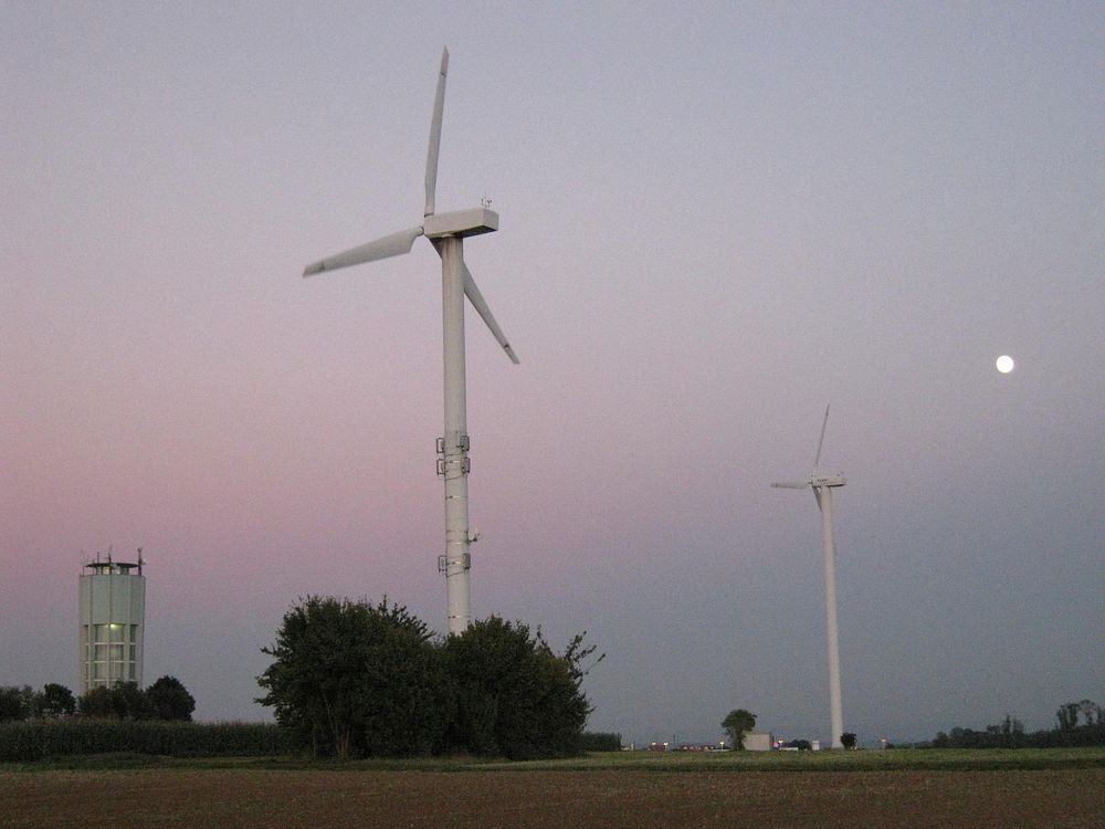 Wind turbines at dawn. Original public domain image from Wikimedia Commons