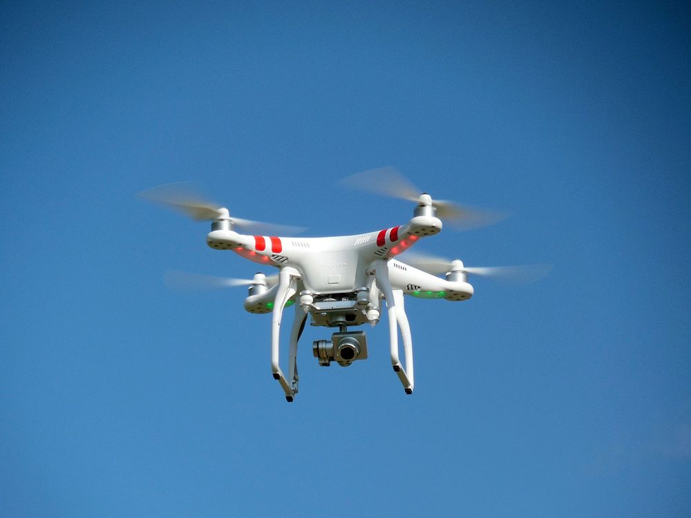 Spying quadcopter. Original public domain image from Wikimedia Commons