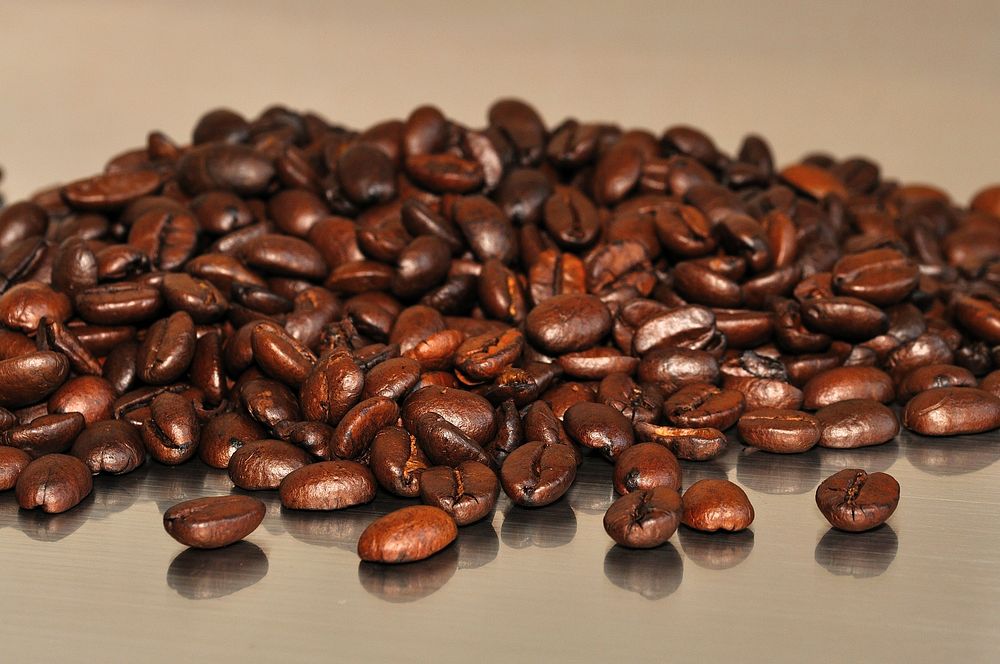 Coffee beans background. Original public domain image from Wikimedia Commons