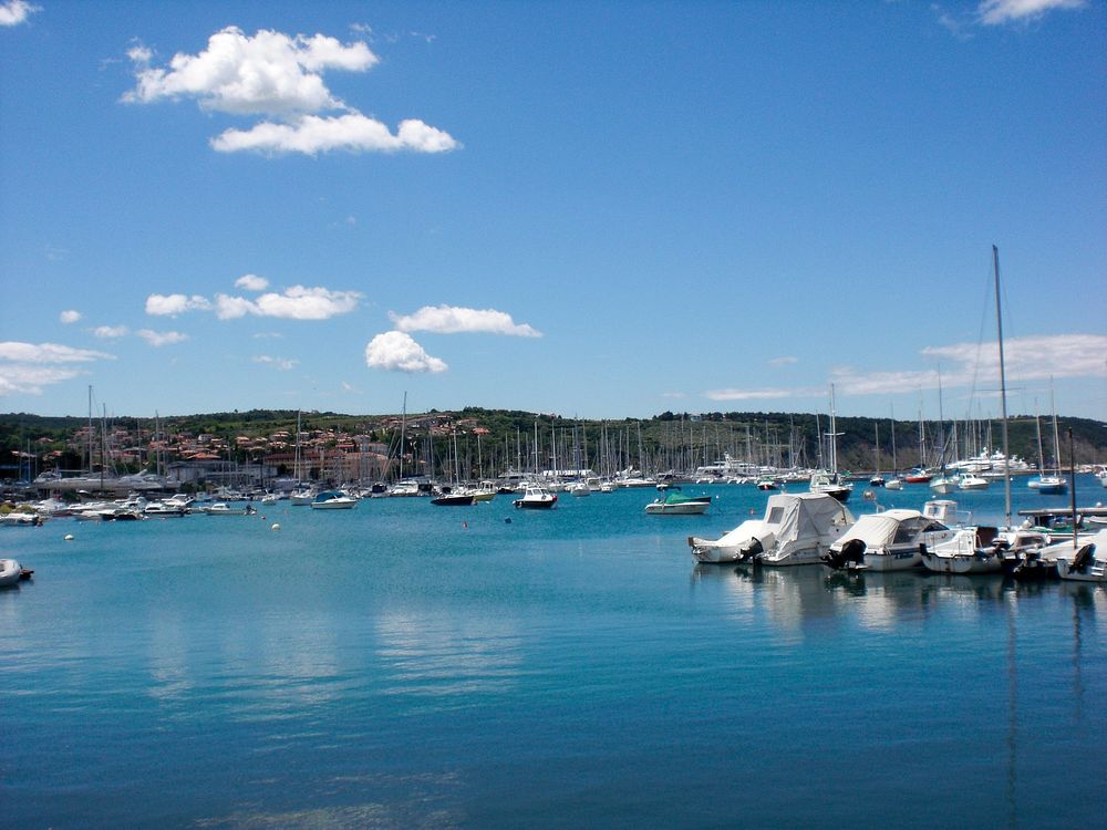 Izola town harbour with a lot of boats. Original public domain image from Wikimedia Commons