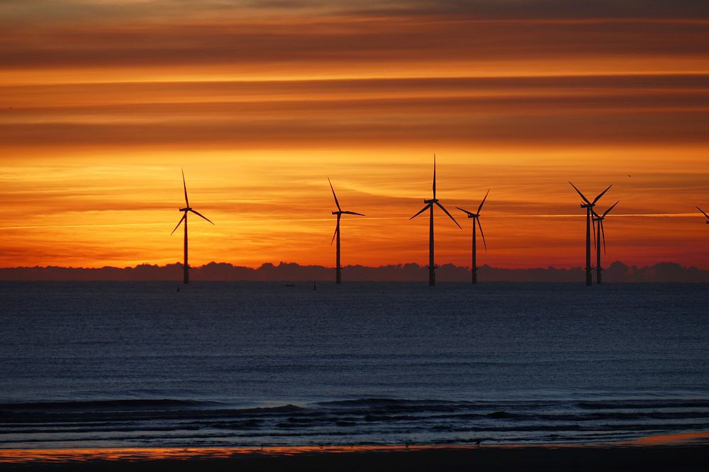 Dawn and some wind turbines. Original public domain image from Wikimedia Commons