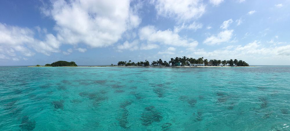 A panoramic photograph of Laughing Bird Caye in Belize, photographed from the west. Original public domain image from…