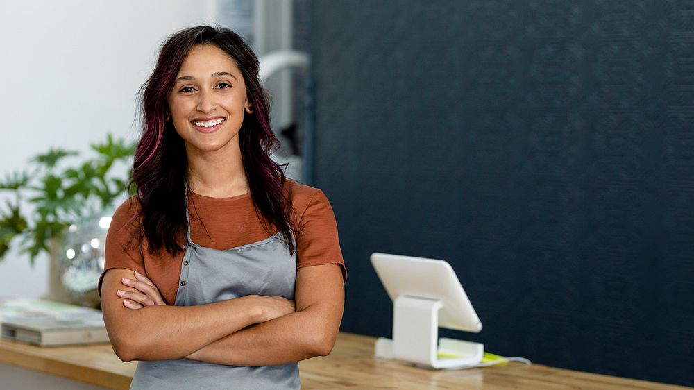 Small business owner at a cash register