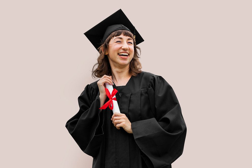 Female student celebrating graduating from college