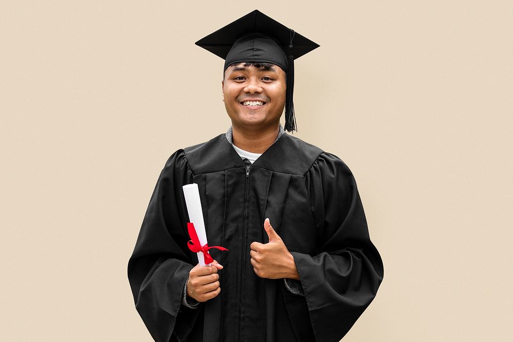 Graduating university student in graduation gown