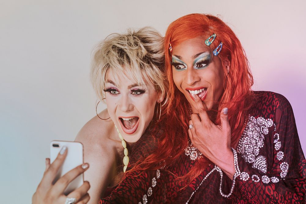 Beautiful drag queens taking selfie