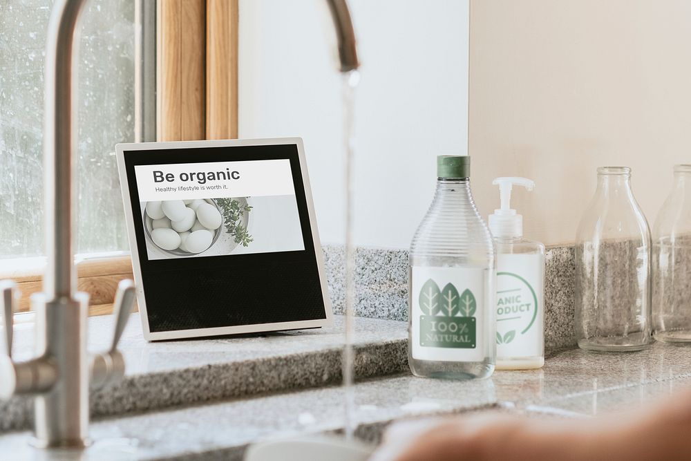 Smart home hub tablet by kitchen sink