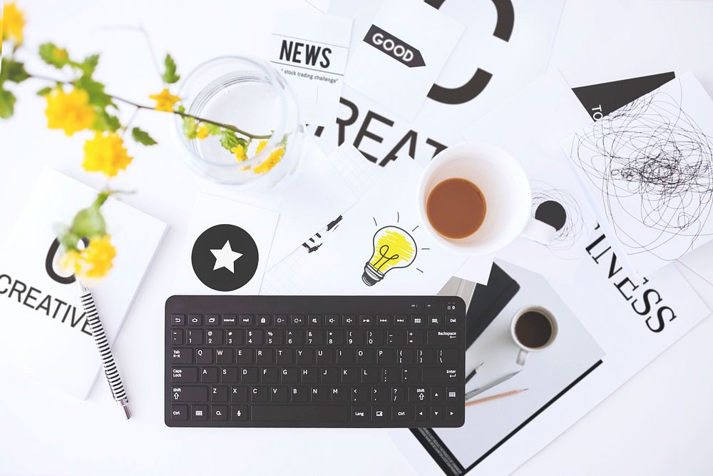 Black keyboard and stationery flat lay. Visit Kaboompics for more free images.