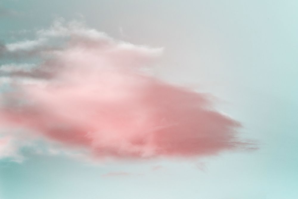 Blue sky and soft pink clouds
