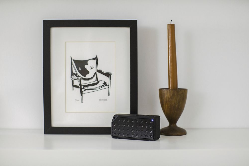Free bluetooth speaker with home decors image, public domain interior design CC0 photo.