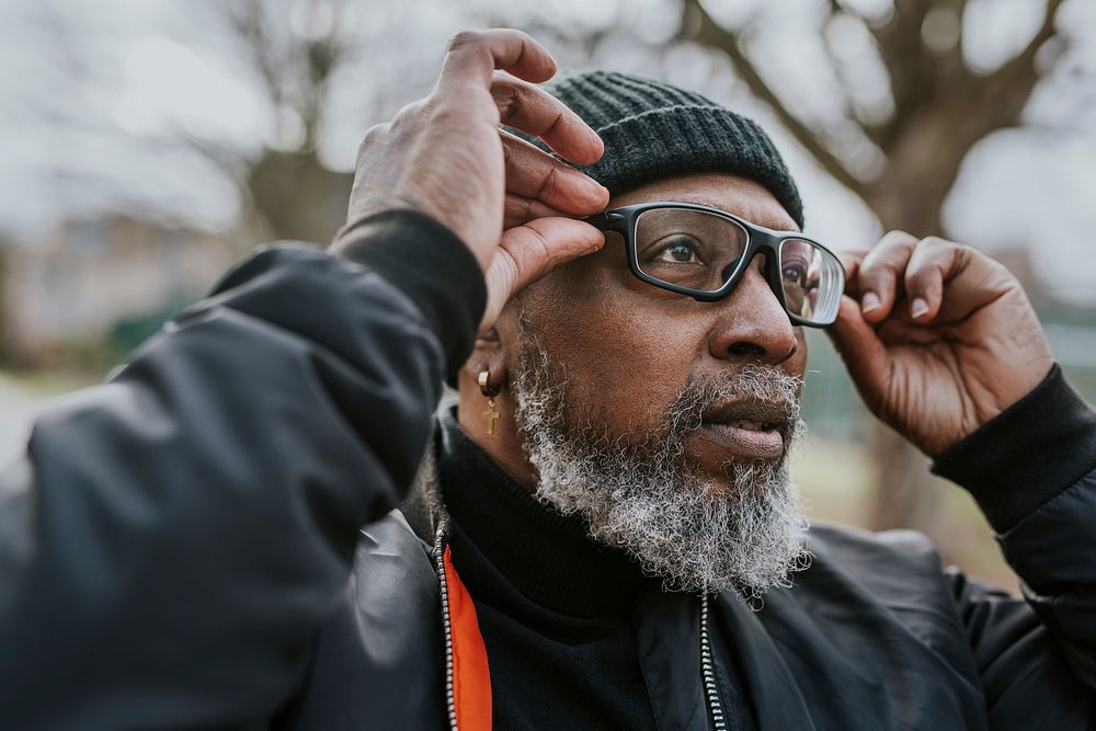 Cool senior African man with trendy glasses