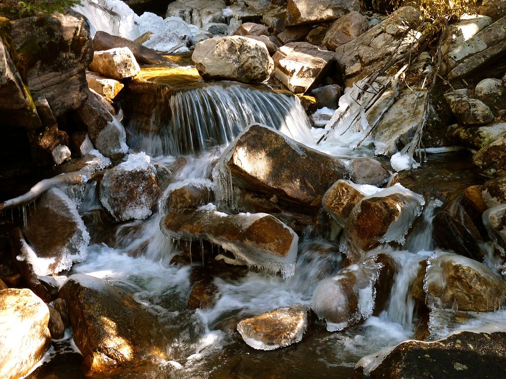 Water freezes on rocks along Ostler Fork Creek below Amethyst Lake, Uinta-Wasatch-Cache National Forest. Original public…