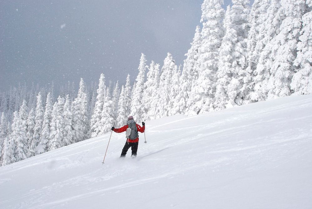 Backcountry skier winter snow. Original public domain image from Flickr