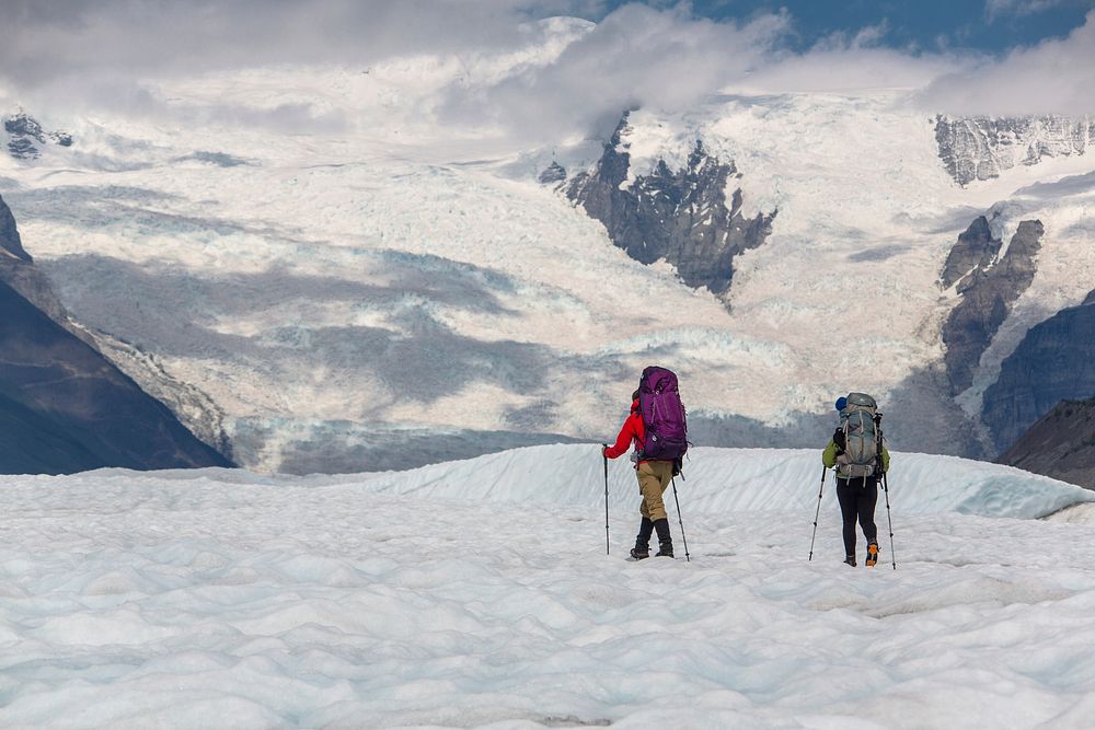 Backpackers exploring the Root Glacier. Original public domain image from Flickr