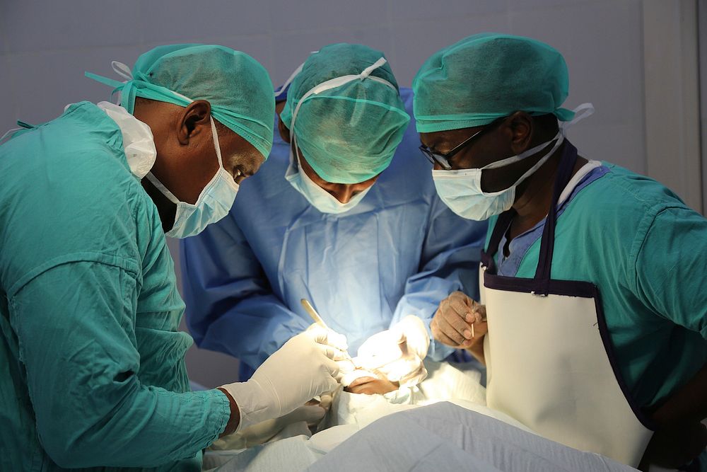 A team of surgeons, anesthetists and nurses perform cleft lip and palate surgery on a patient at the c, on August 30, 2018.…