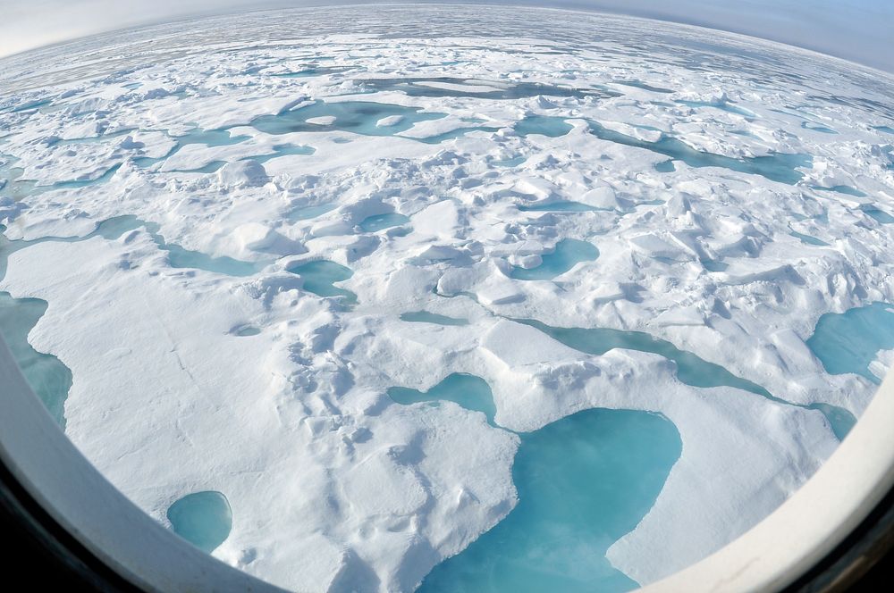 ARCTIC OCEAN - A multi-year ice floe slides down the starboard side of the Coast Guard Cutter Healy Aug. 12, 2009, as the…