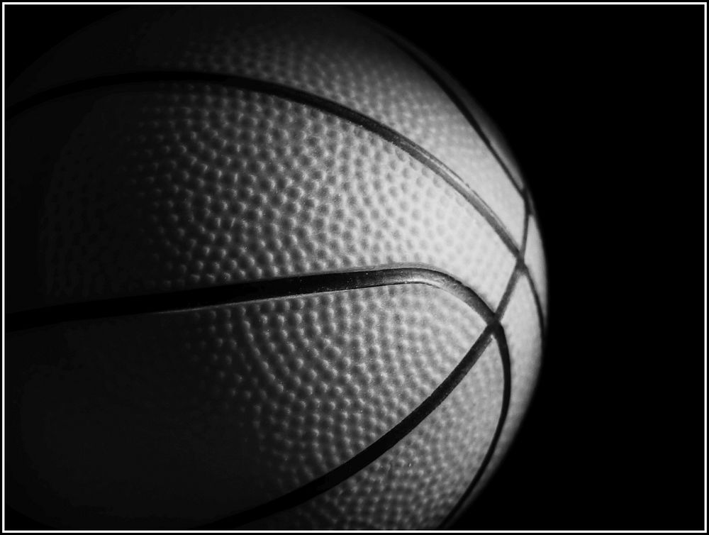 Closeup on basketball in black and white. Free public domain CC0 photo.