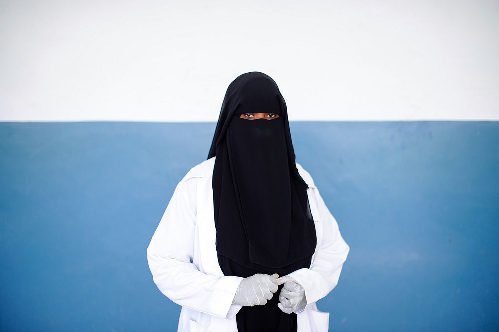 Premium Vector  Young muslim woman wearing hijab taking selfie aesthetic  profile pink background