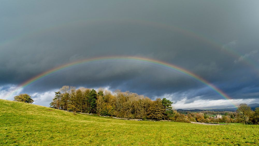 Double rainbows and cloudy sky in autumn. Original public domain image from Flickr