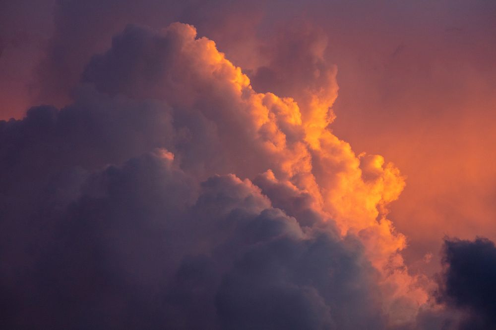Sunset on storm clouds. Original public domain image from Flickr