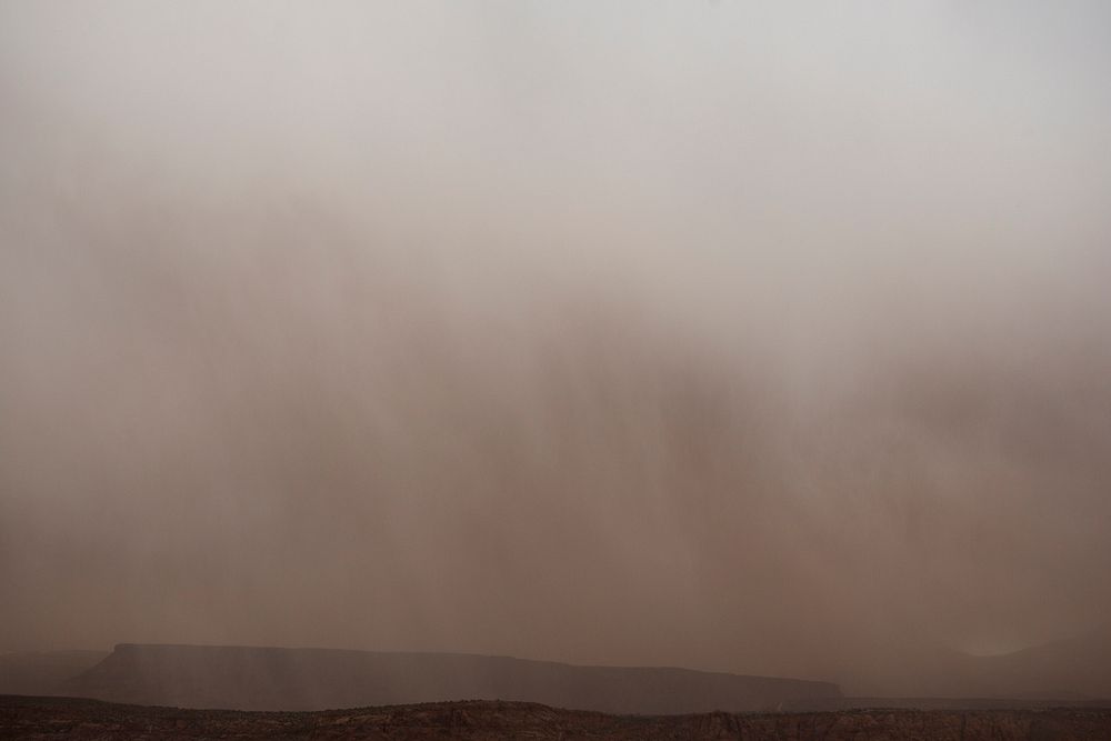 Dust & rain obscure the La Sal Mountains near Moab