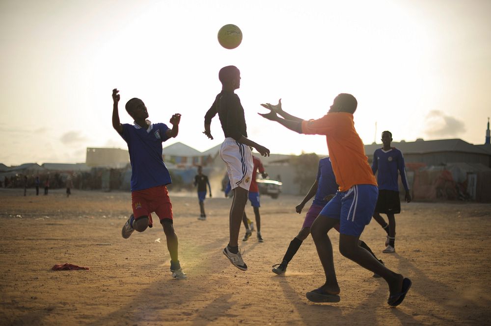 Children play football next to an IDP camp in Mogadishu, Somalia, on August 19.