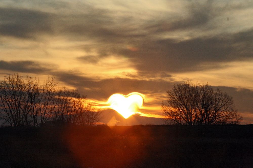Evening background, heart shaped sun. Free public domain CC0 image.