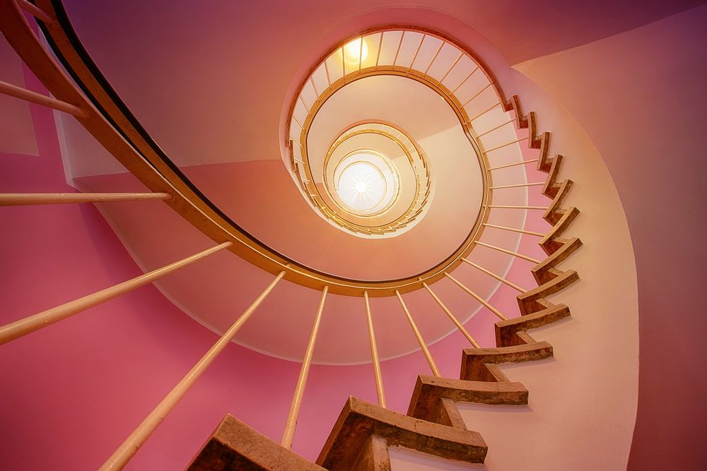 Free spiral stairways from a low angle image, public domain architecture CC0 photo.