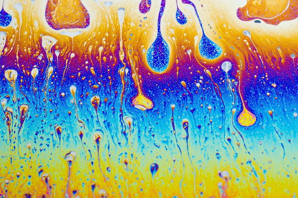 Rainbow abstract water drop texture. Free public domain CC0 photo.