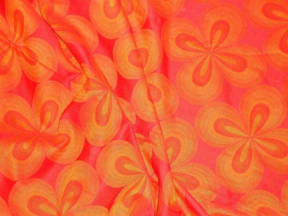 Orange flower cloth texture. Free public domain CC0 photo.