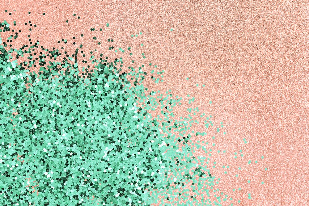 Glittery turquoise confetti on a pink background 